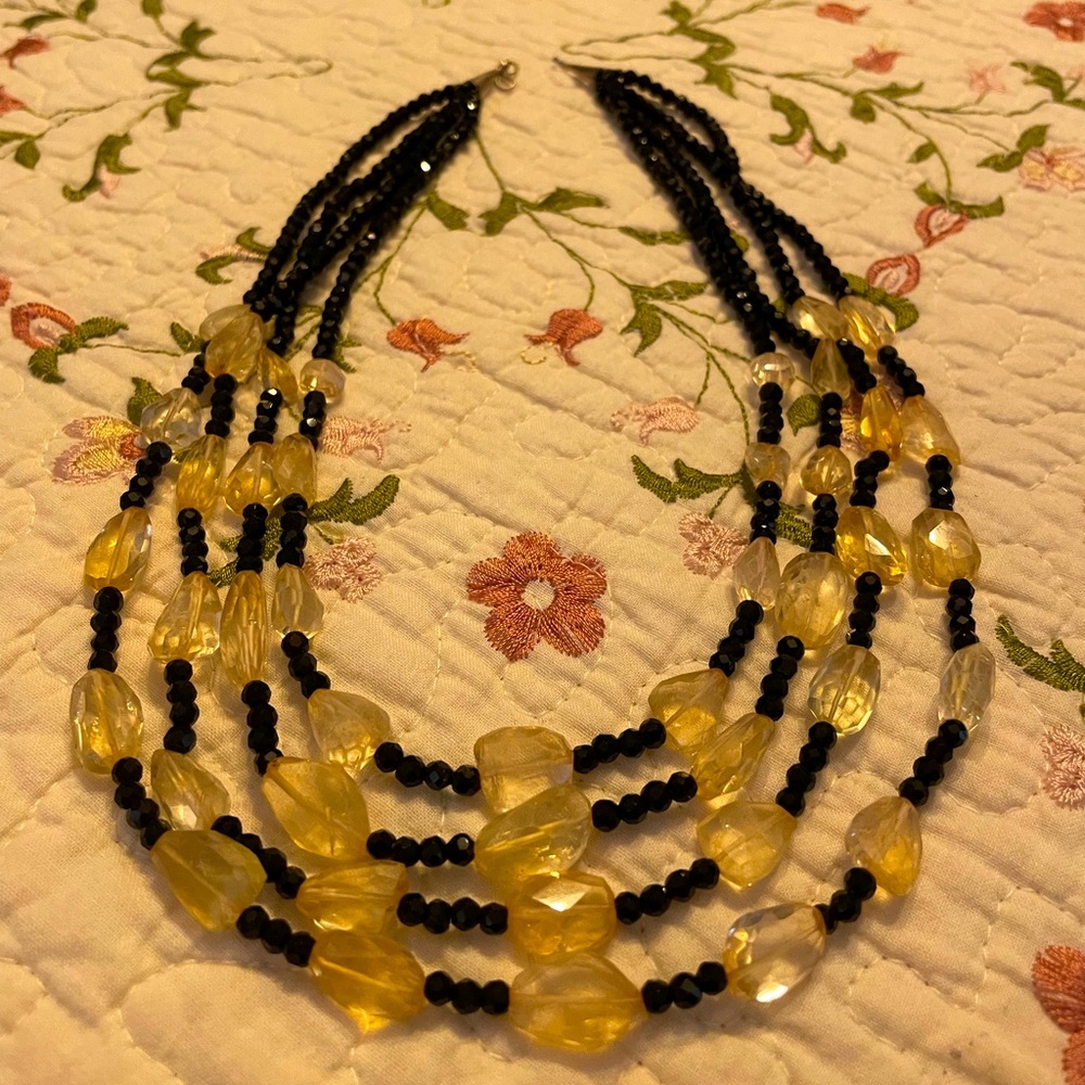 Black & Yellow beaded necklace. Purchased at Henri Bendel in NYC. Silver clasp